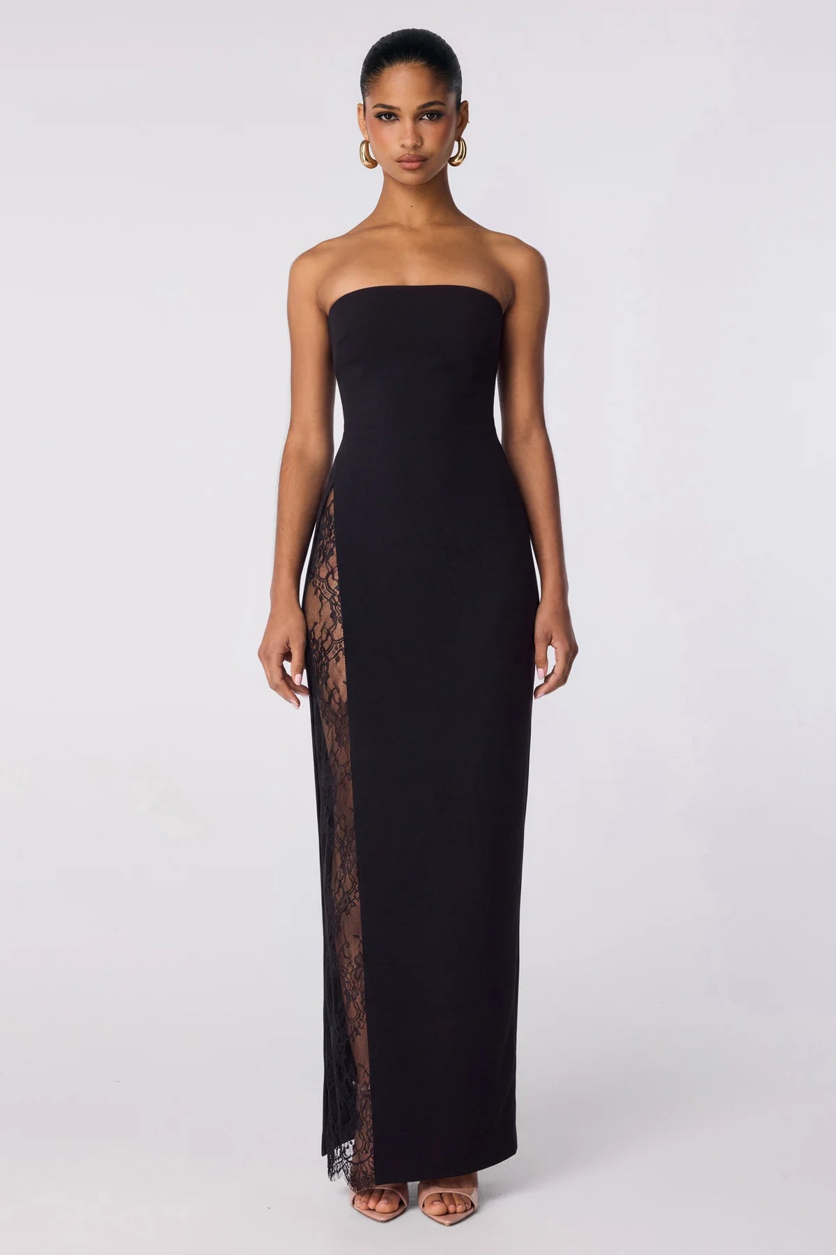 Black strapless gown with a lace side panel